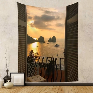 Detail of Mediterranean sunset tapestry with balcony and sea view printed on fabric