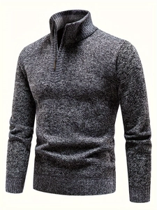 Detail of men's half-zip knit sweater showing ribbed collar and marled texture