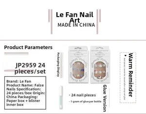 Detailed view of 24pcs almond press-on nails with white flowers and pearls, model JP2959