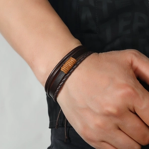 Multi-layer men's leather bracelet with braided strands and vintage brown wrap detail
