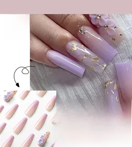 Detail of purple gradient long ballerina press-on nails with 3D flowers and gold flakes