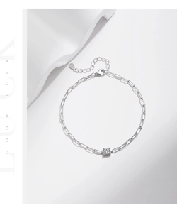 Macro view of S925 sterling silver paperclip chain bracelet with square zircon gemstone