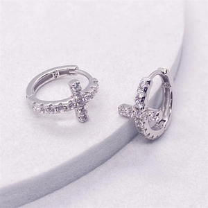 Sparkling S925 sterling silver cross huggie earrings featuring micro-paved cubic zirconia