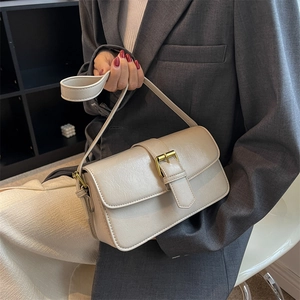Elegant cream-colored oil wax leather crossbody bag with vintage gold square buckle