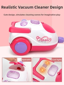 Close-up of pink toy vacuum cleaner with opening lid and glowing LED light effects