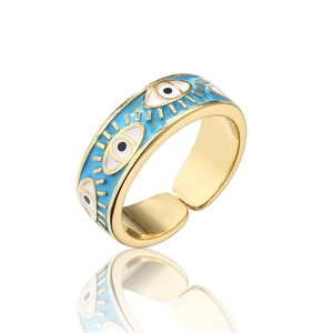 Golden adjustable evil eye ring with blue enamel detailing on a clean white background