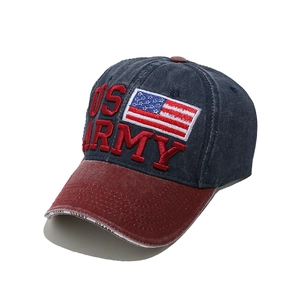 Close-up of US ARMY 3D embroidery and flag patch on washed denim baseball cap