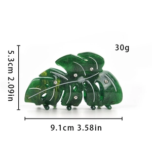 Détails de la pince à cheveux feuille de monstera avec dimensions 9.1cm et strass