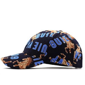 Detailed side view of navy blue hip-hop cap with all-over horse print and GUIP embroidery