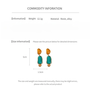 Detailed size and material info for vintage resin oval earrings in orange and turquoise
