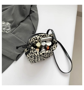 Top view of leopard print bucket bag showing drawstring closure and spacious interior