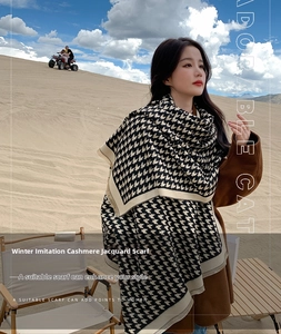 Classic black and white houndstooth cashmere-like scarf with fringe detail in desert setting