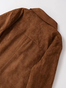 Detailed back view of brown faux suede jacket collar with precise stitching and soft texture