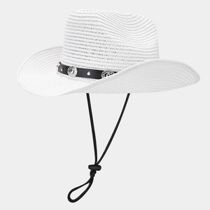 Detail of white straw cowboy hat with black leather band and adjustable chin strap