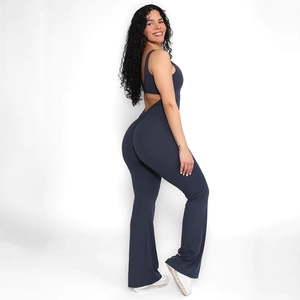 Deep grey backless one-piece jumpsuit with flared legs and flattering slim fit style