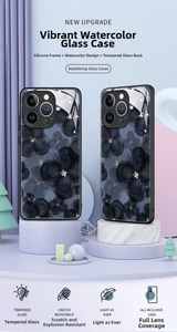 Close-up of iPhone glass case featuring black watercolor flower patterns and lens protection