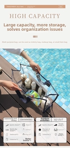 Close-up of clear waterproof swimming bag with navy blue handles poolside