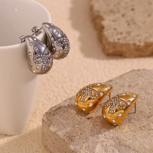 Water-drop earrings with rhinestone butterfly patterns in gold and silver finish