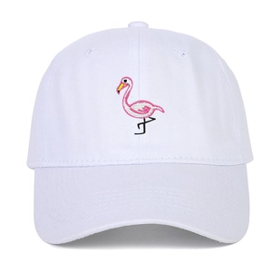 White cotton baseball cap featuring detailed pink flamingo embroidery on the front panel