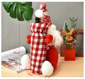 Detail of Christmas Rudolf gnome wine bottle cover with knit hat and dimensions