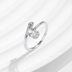 Sparkling S925 silver oval cut engagement ring with brilliant zircon on wave background
