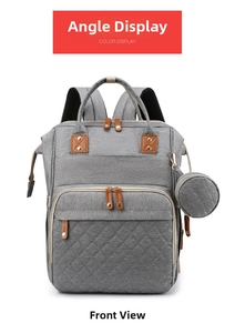 Detailed front view of grey multifunctional diaper bag with quilted patterns and coin purse