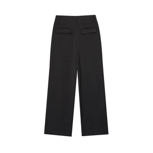Detailed back view of black wide-leg trousers showing symmetrical flap pockets and woven texture