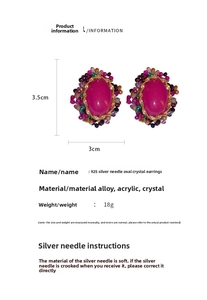 Macro view of vintage oval crystal earrings with rose red stones and beaded details