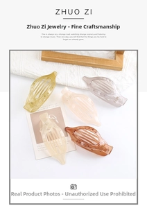 Close-up of translucent oval hair clips in assorted colors like yellow, pink and beige