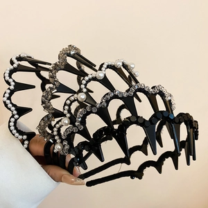 Detail shot of wavy tooth headbands with pearls and crystals for a secure, stylish grip