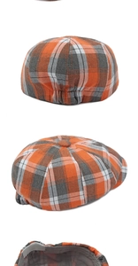 Détails d'une casquette gavroche à carreaux avec bande élastique et bandeau intérieur
