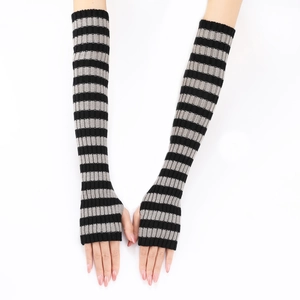 Detailed knit texture of black and grey striped long fingerless arm warmer gloves