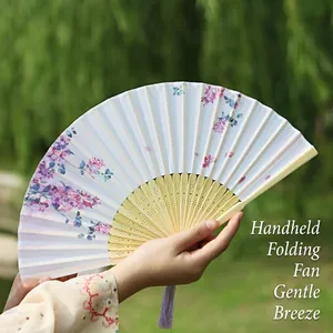 Chinese vintage folding fan with purple lilac prints, bamboo ribs and a silk tassel