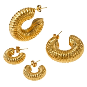 Pair of golden stainless steel twist hoop earrings with elegant spiral texture design