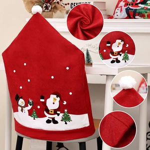 Christmas non-woven chair covers featuring Santa and Snowman for holiday dining decor