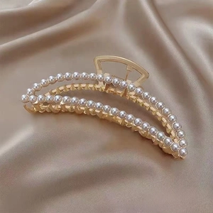Detailed view of 11cm gold flower hair claw clip with elegant pearls and sturdy spring