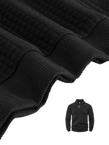 Macro detail of black waffle knit texture and polo collar on men's pullover sweatshirt