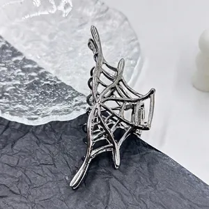 Gothic spider web hair claw clip in dark silver metal alloy for Halloween styling