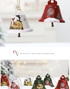Close-up of painted metal Christmas bells with Santa and Snowman motifs for festive decor