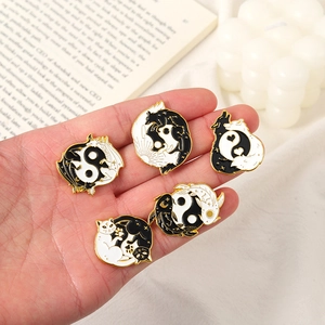 Yin Yang animal enamel pins set with cats and koi fish in black and white finish