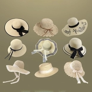 Detailed collection of nine summer straw hats featuring various ribbon and lace designs