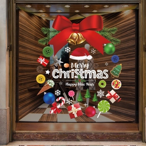 Festive Christmas wreath window sticker with red bow and Merry Christmas text