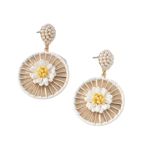 Bohemian raffia flower earrings with gold metal and pearls on a white background