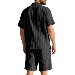 Back view of a men striped linen short sleeve shirt and beach shorts set in black and white