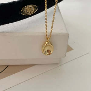 Minimalist 925 sterling silver gold-plated necklace with a sleek oval concave pendant