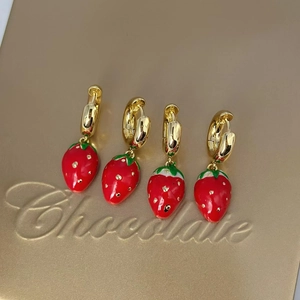 Cute red strawberry dangle earrings with gold hooks for a festive Christmas look