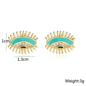 Detailed view of evil eye earrings measuring 1.3cm wide by 1cm high with 3g weight