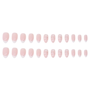 Short almond press-on nails with pink base, white French tips and cloud patterns