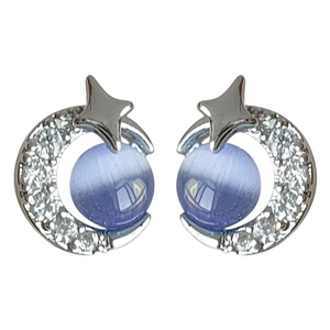 Star and moon stud earrings with cat eye stones and micro-set cubic zirconia in silver