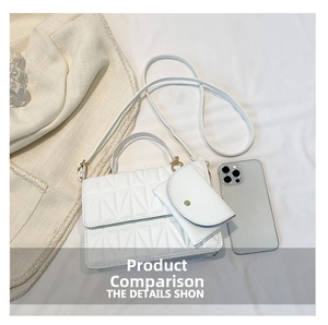 Detailed macro view of white quilted shoulder bag featuring gold buckles and matching coin purse